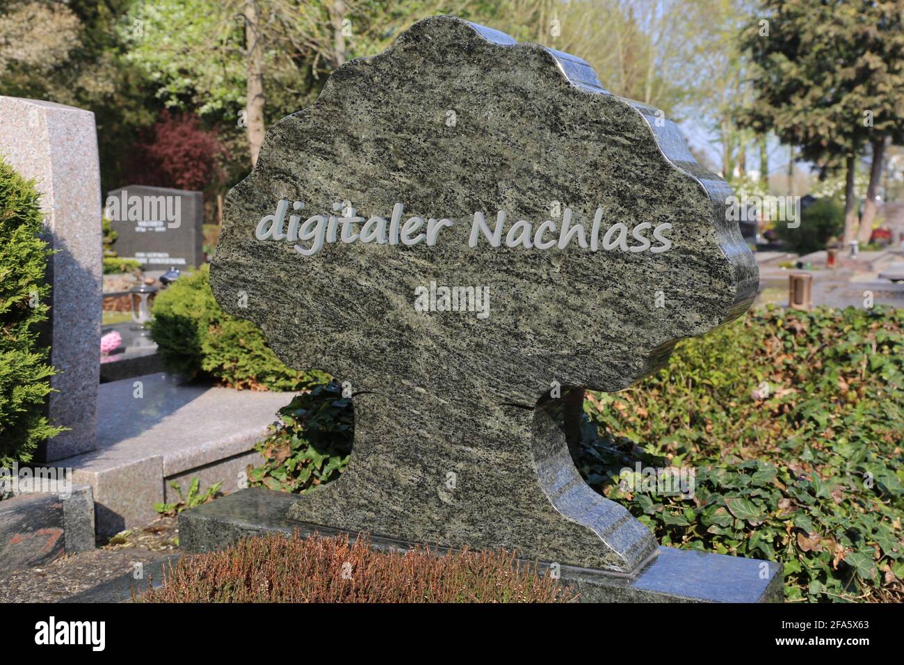 Symbol image: Gravestone with the german inscription digitaler Nachlass (digital legacy) Stock Photo