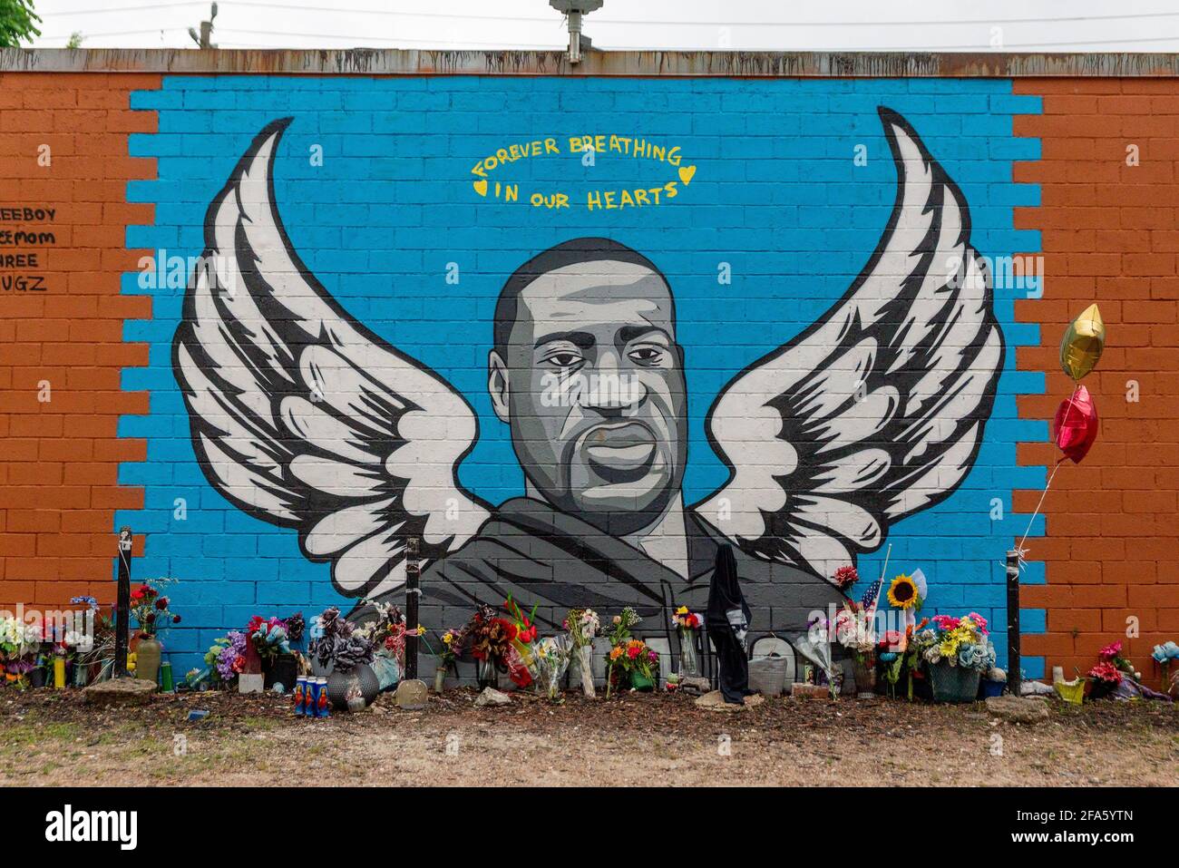 Houston, USA. 22nd Apr, 2021. Fresh flowers, balloons, and other tokens are left at a George Floyd Mural in Third Ward, Houston, TX on April 22, 2021. Derek Chauvin was found guilty on all three counts for Floyd's death in Minneapolis on May 25, 2020. (Photo by Jennifer Lake/SIPA USA) Credit: Sipa USA/Alamy Live News Stock Photo