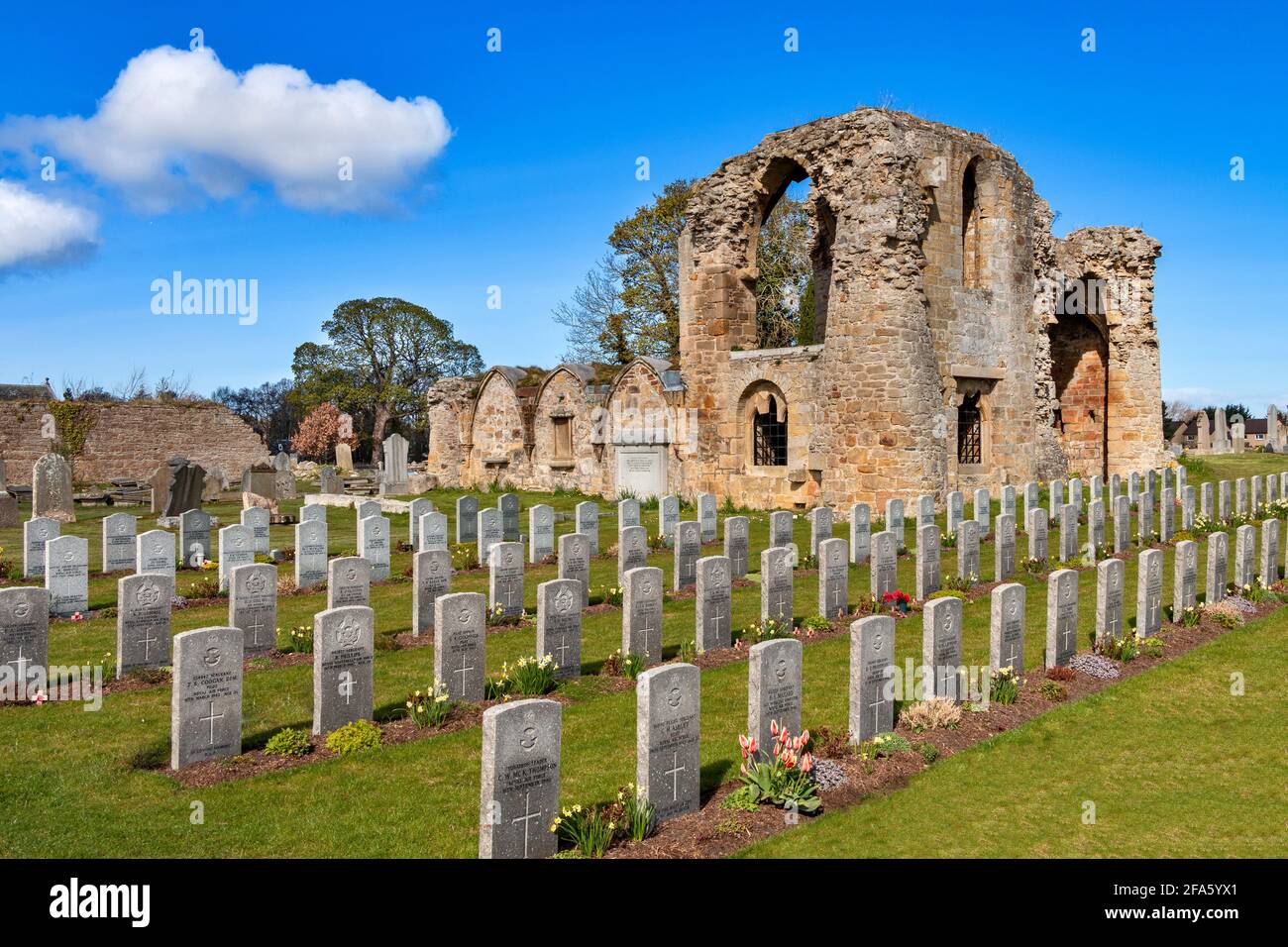 KINLOSS ABBEY MORAY SCOTLAND ROWS OF COMMONWEALTH AIR FORCE WAR GRAVE STONES IN FRONT OF THE ABBEY Stock Photo