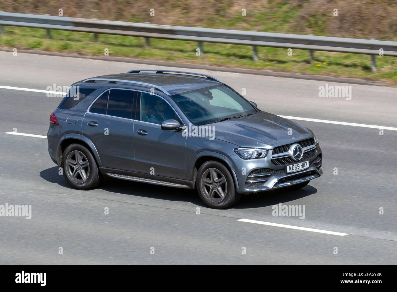 New 2020 grey Mercedes Benz Gle 300 Amg D 4Matic; moving vehicles, cars,  vehicle driving on UK roads, motors, motoring on the M6 English motorway  road network Stock Photo - Alamy