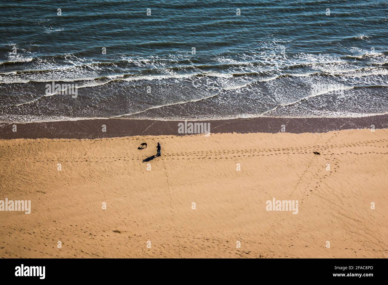 people on beach at Gower, Wales. Stock Photo