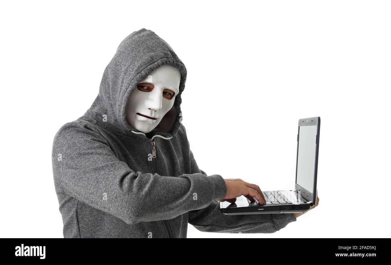 Professional hacker with laptop isolated on white background Stock Photo