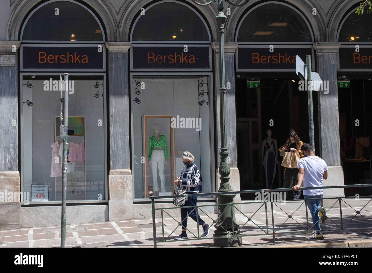 People seen walking past a Bershka store at Ermou street close to Syntagma  square (Photo by Nikolas Joao Kokovlis / SOPA Ima/Sipa USA Stock Photo -  Alamy