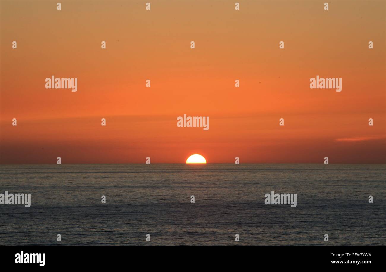 (210423) -- BEIRUT, April 23, 2021 (Xinhua) -- Sunset is seen in Beirut, Lebanon, April 22, 2021. (Xinhua/Liu Zongya) Stock Photo