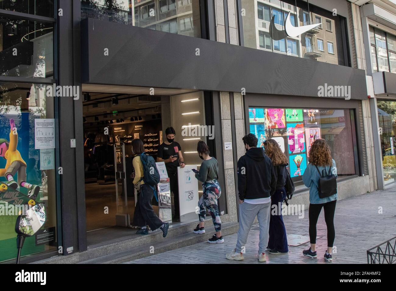 Athens, Greece. 22nd Apr, 2021. People seen waiting outside Nike store  close to Syntagma square. Credit: Nikolas Joao Kokovlis/SOPA Images/ZUMA  Wire/Alamy Live News Stock Photo - Alamy