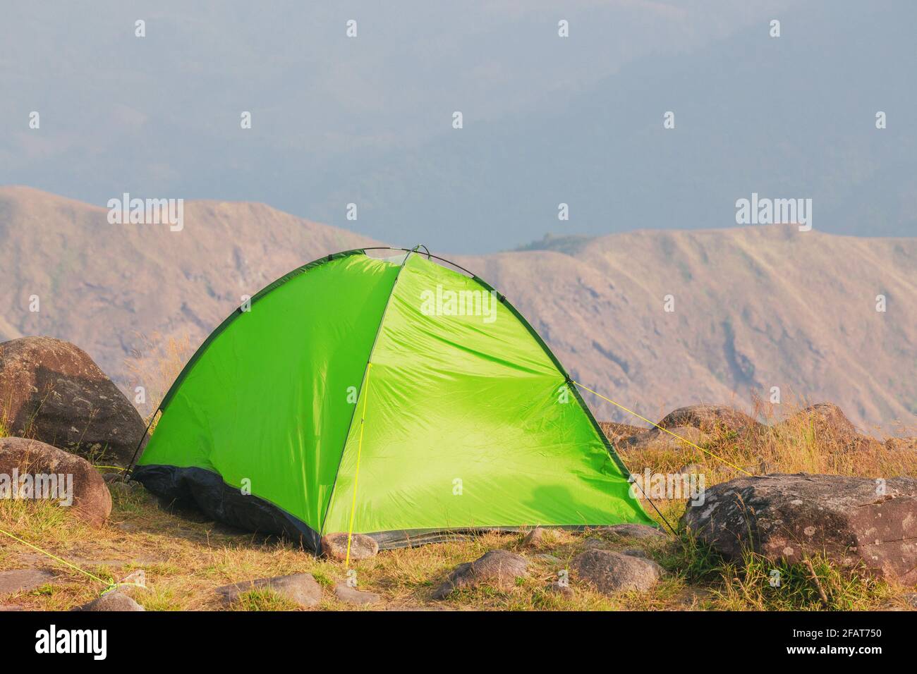 Set up a tent on the hill Full of grasslands Stock Photo - Alamy