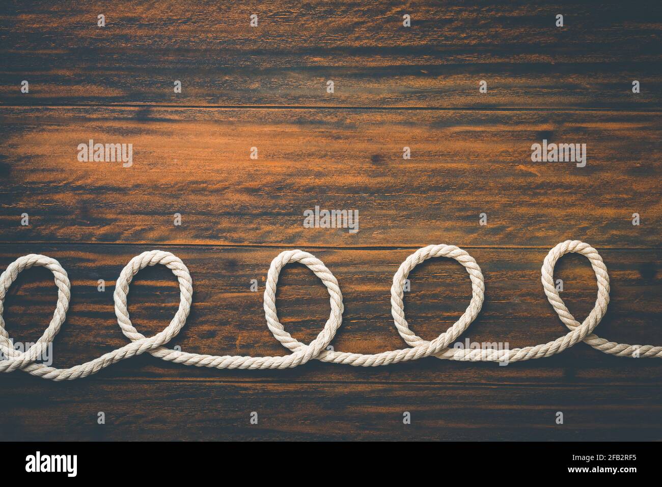 Nautical background with rope Stock Photo - Alamy