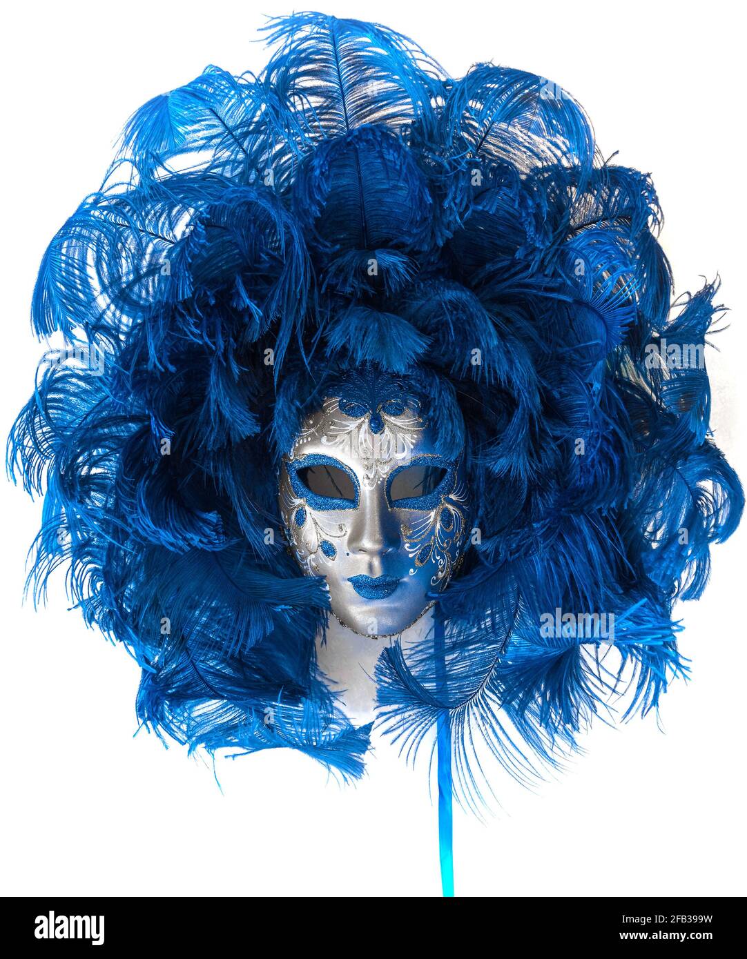 VENICE, ITALY - SEPTEMBER 27, 2017: Venetian female carnival mask close up on a light background Stock Photo