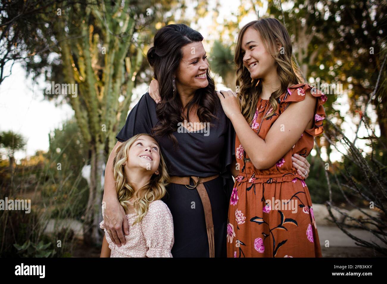 Mom & Daughters Smiling in Desert Garden in San Diego Stock Photo Alamy
