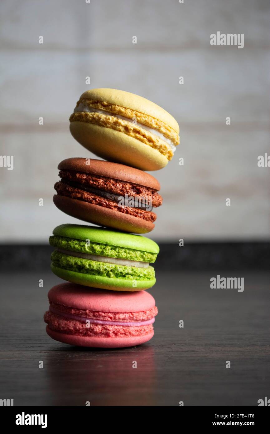 Multicolored macarons in the kitchen Stock Photo