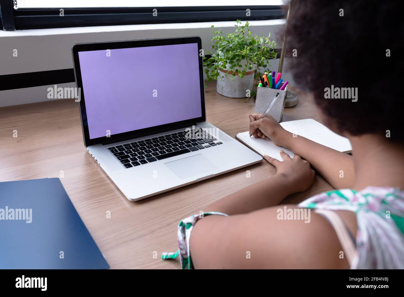 Call Write Notes African american businesswoman having video call writing notes using ...
