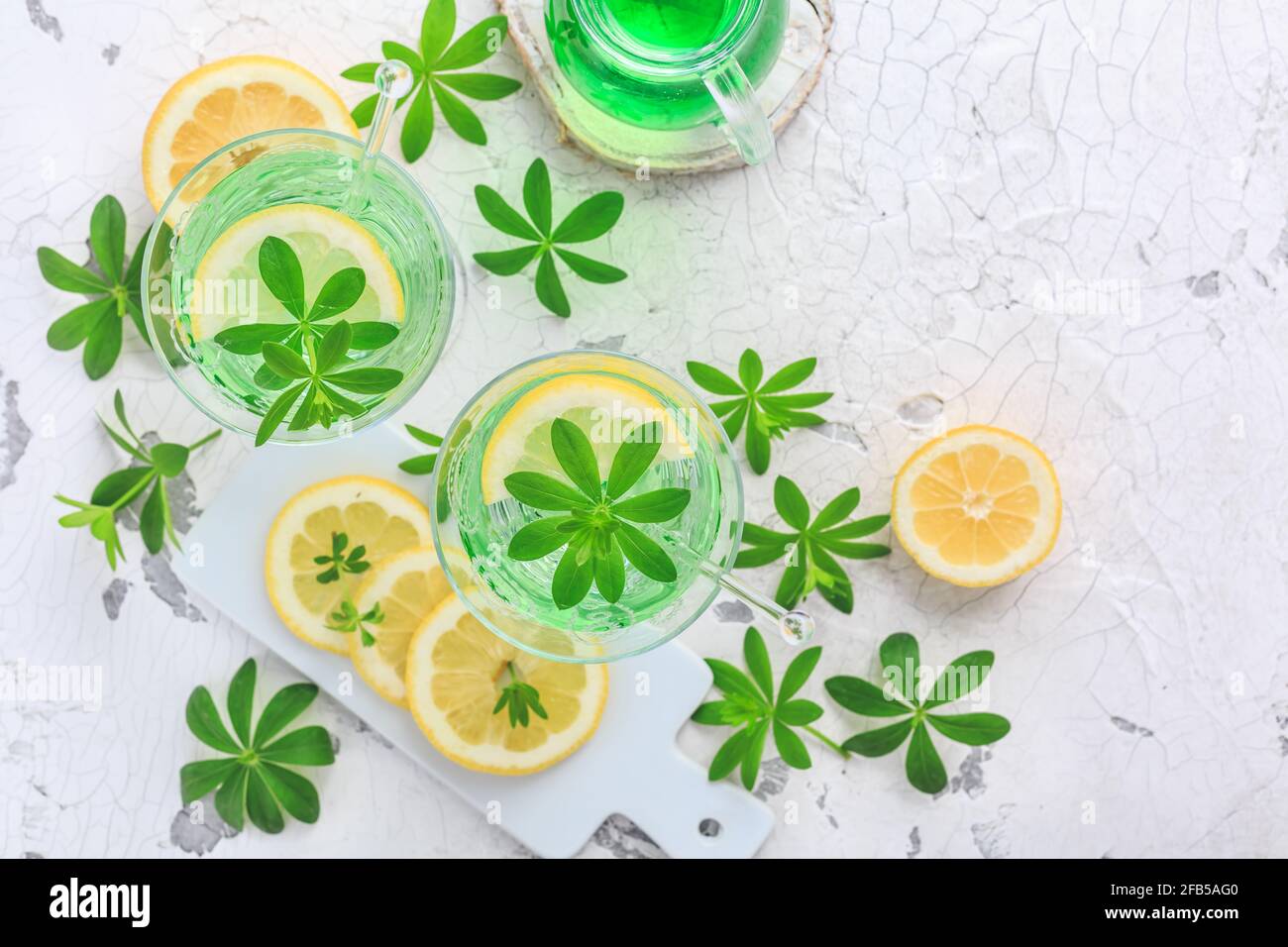 Homemade lemonade with sweet woodruff and lemon (Galium odoratum) Stock Photo