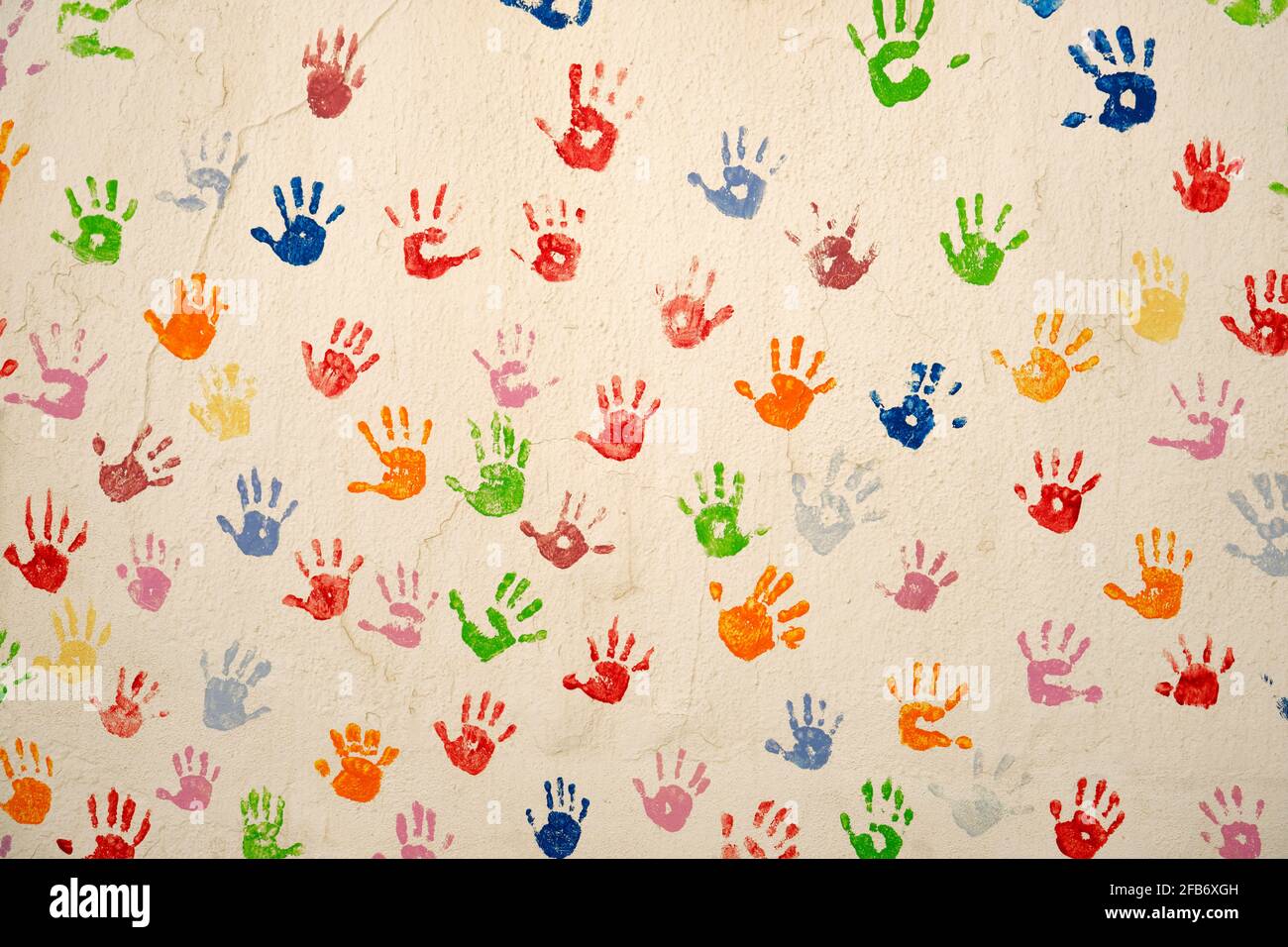 Painted wall with child's hands. Ericeira, Portugal Stock Photo
