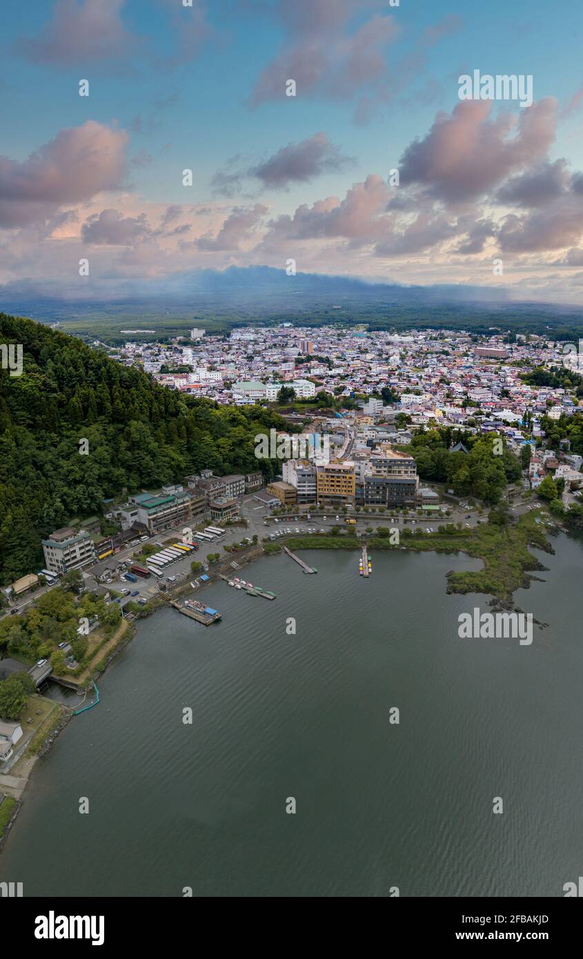 Vertical photo of Kawaguchi lake and townscape near lake side Stock Photo