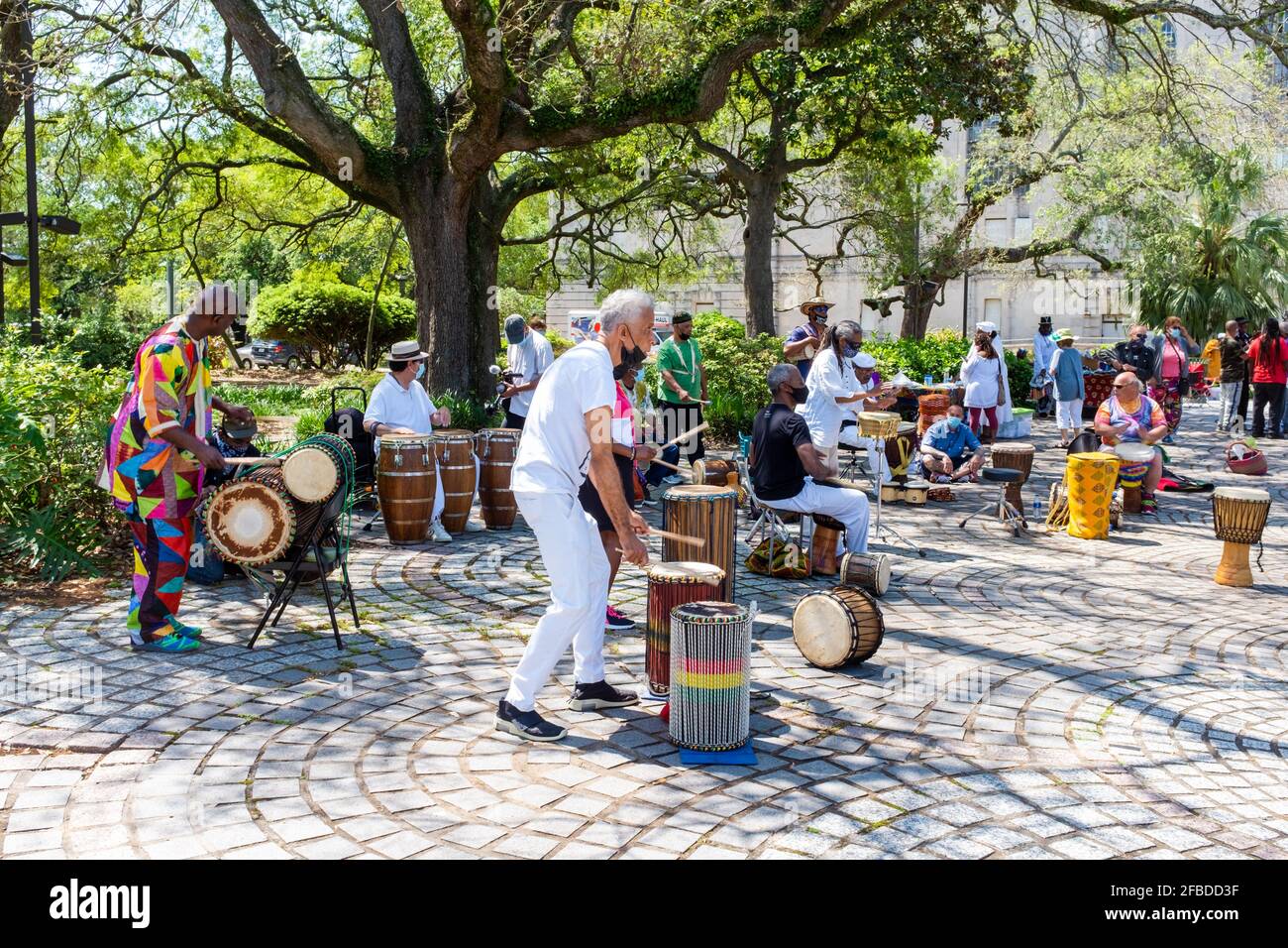 NEW ORLEANS, LA, USA - APRIL 11, 2021: Percussionists perform in Congo Square to celebrate the life of Alfred 'Uganda' Roberts Stock Photo