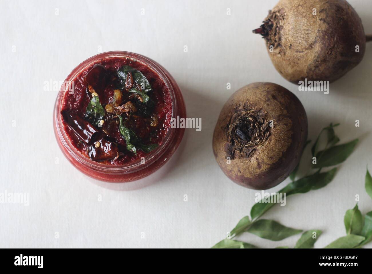 Homemade fresh spicy and sweet condiment made with beetroot, chillies, coconut shallots and spices. Locally known as Beetroot coconut chutney. Shot on Stock Photo