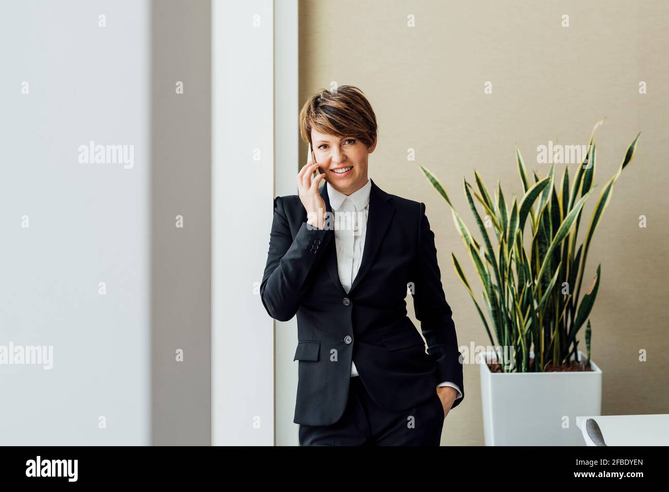 Smiling contented entrepreneur in hi-res stock photography and images ...