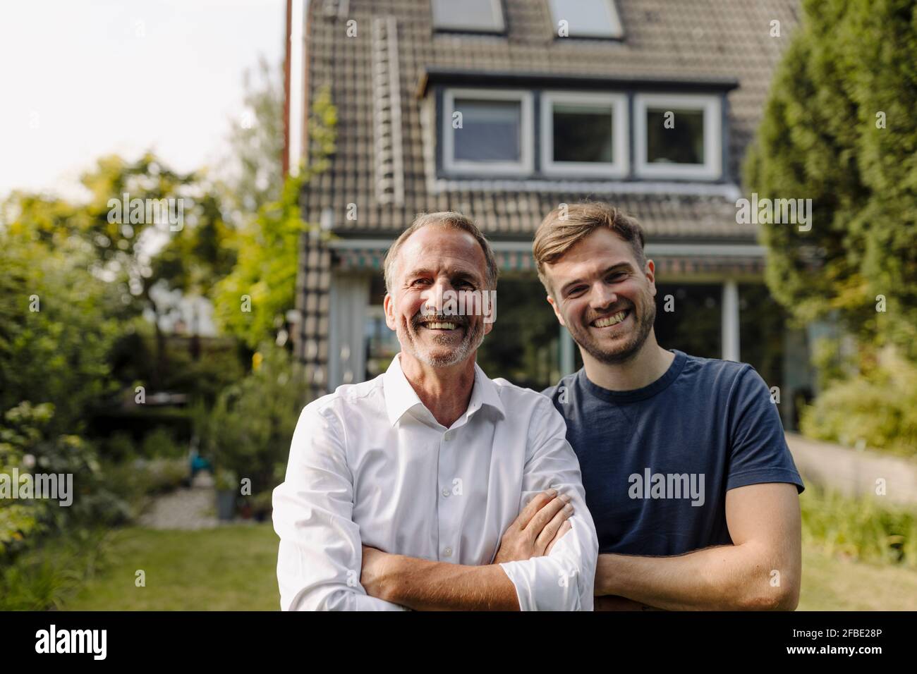 Father son in backyard house hi-res stock photography and images - Alamy