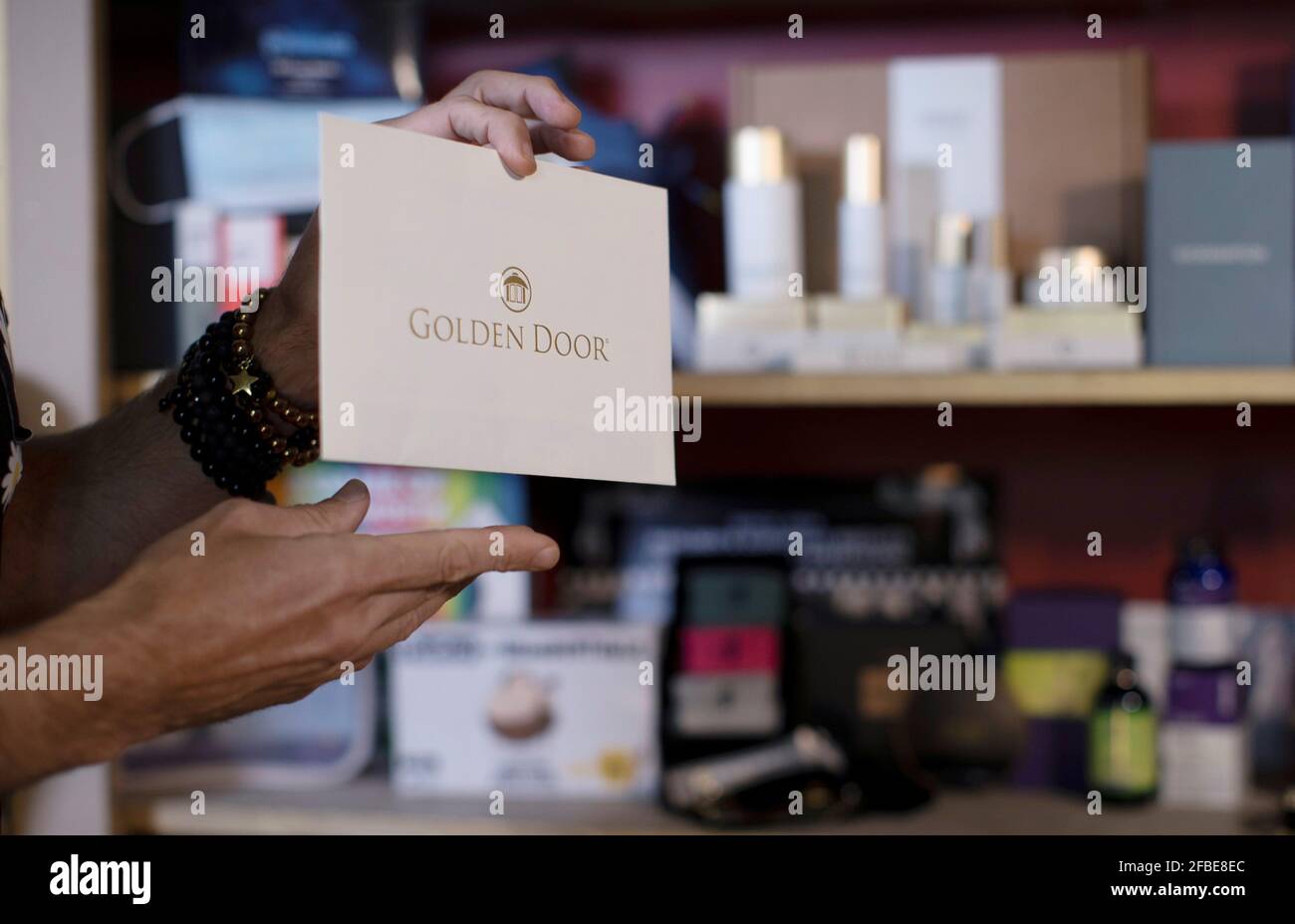 Lash Fary, founder of Distinctive Assets, shows an item to be included