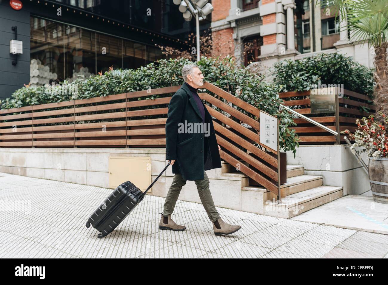 Man walking side view jacket hi-res stock photography and images - Alamy