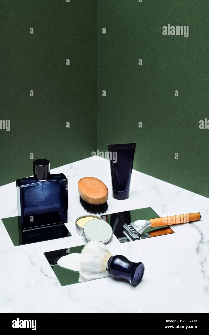 Male grooming products on marble table Stock Photo