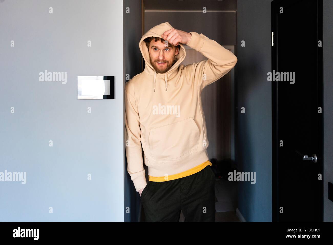 Man in hood and room hi-res stock photography and images - Alamy