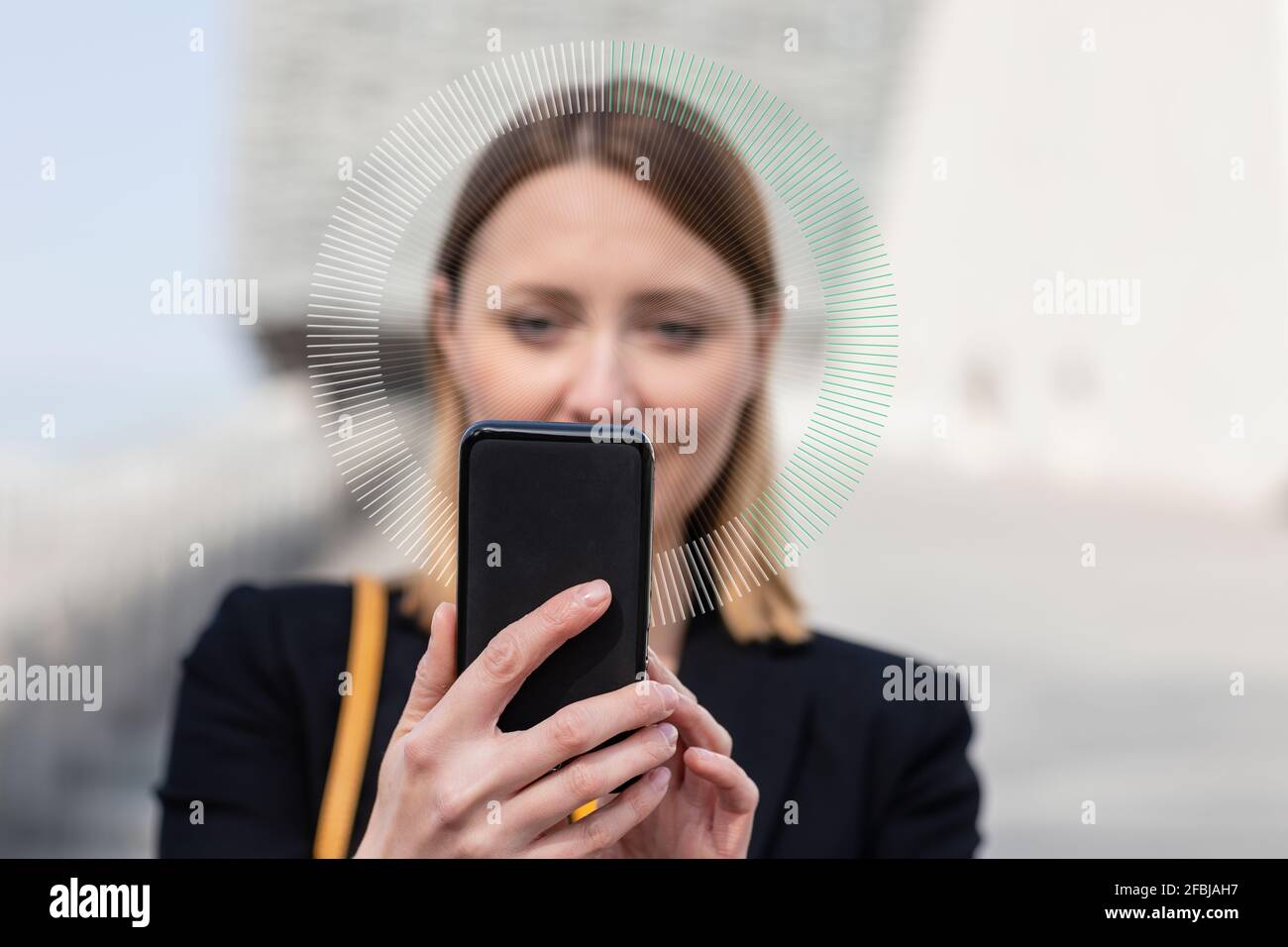 Entrepreneur using mobile phone outdoors Stock Photo