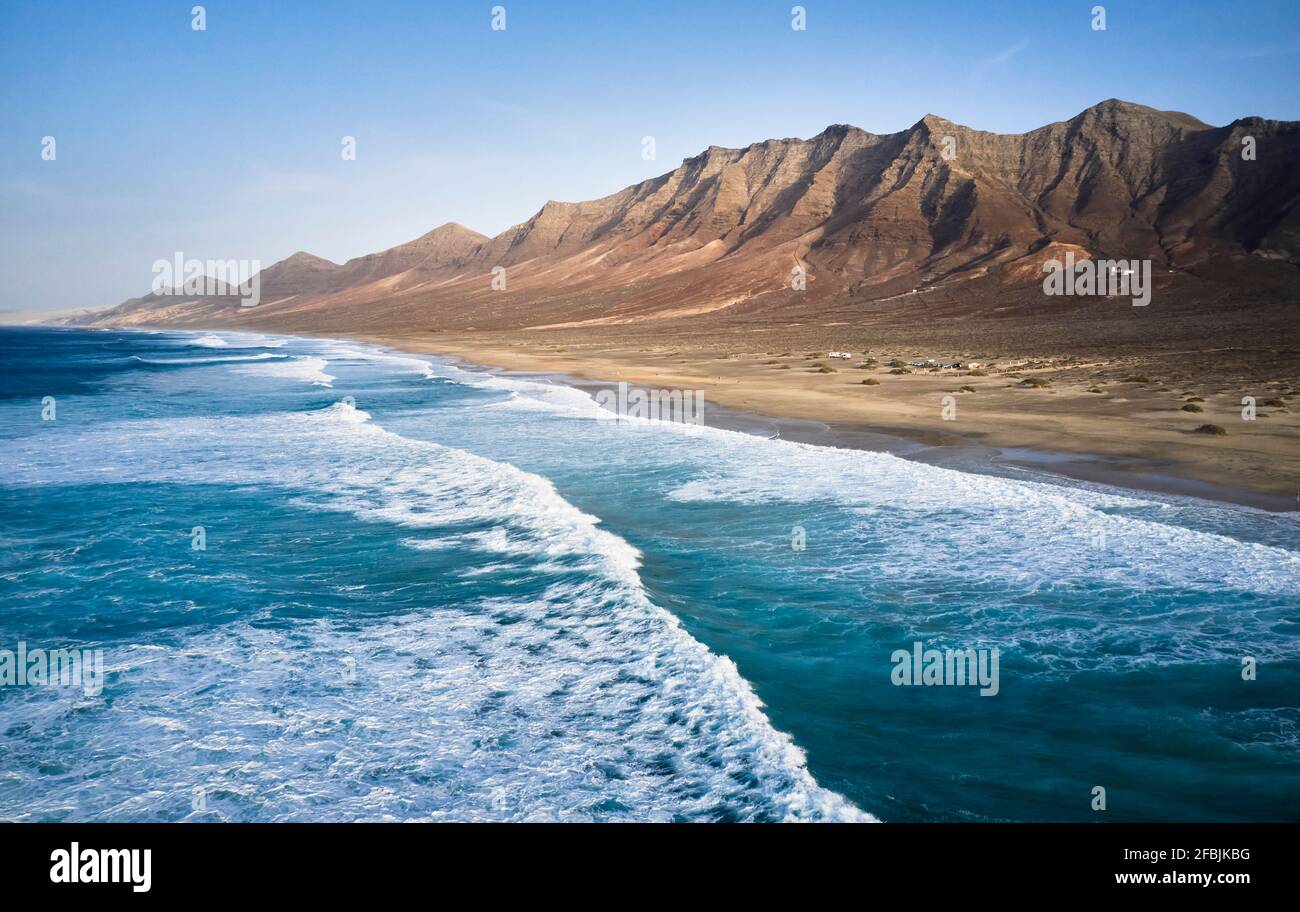 Spain, Canary Islands, Fuerteventura, Aerial view of sandy beach Playa de Cofete and Pico de la Zarza Stock Photo