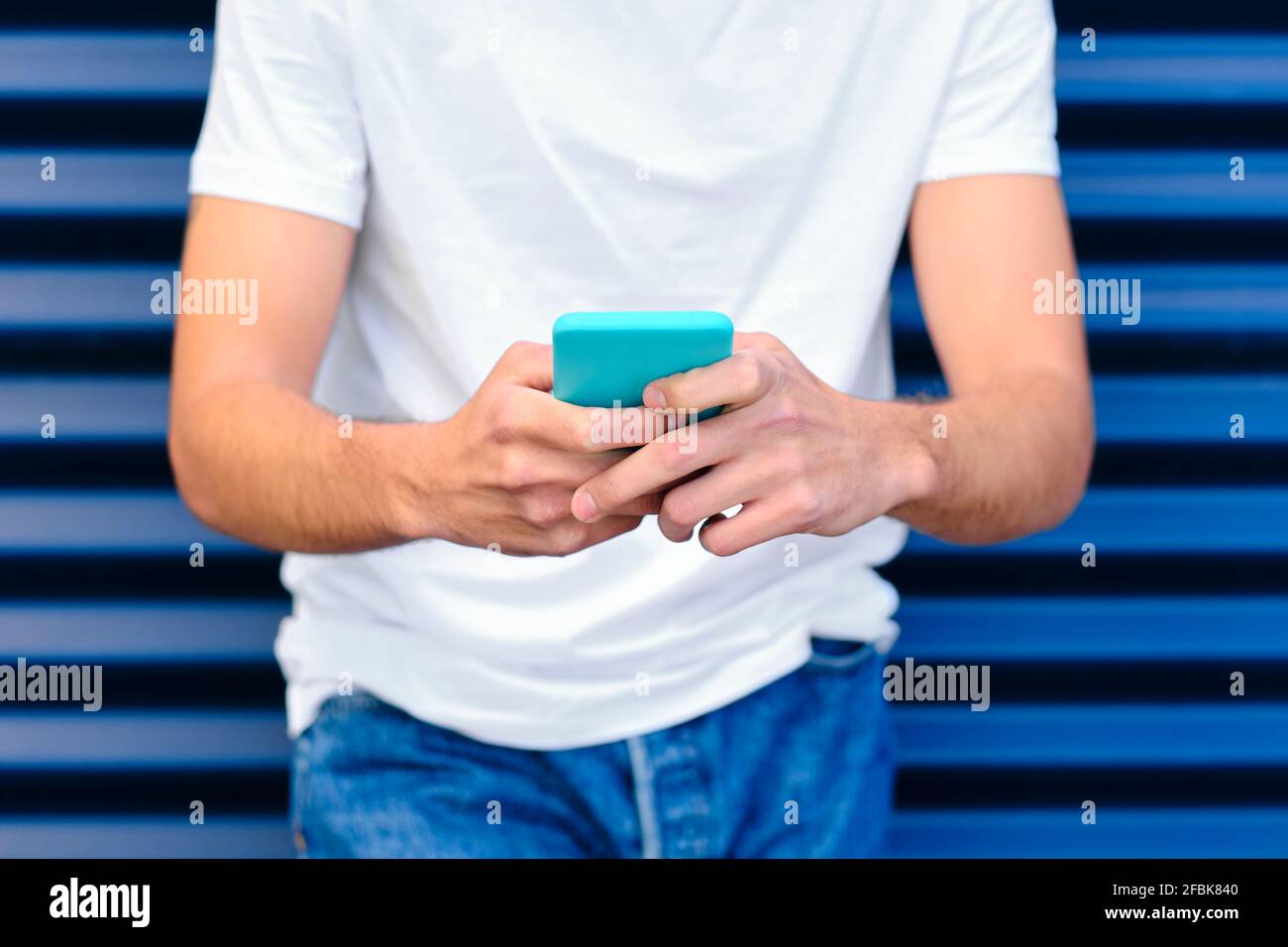 Young man using smart phone Stock Photo