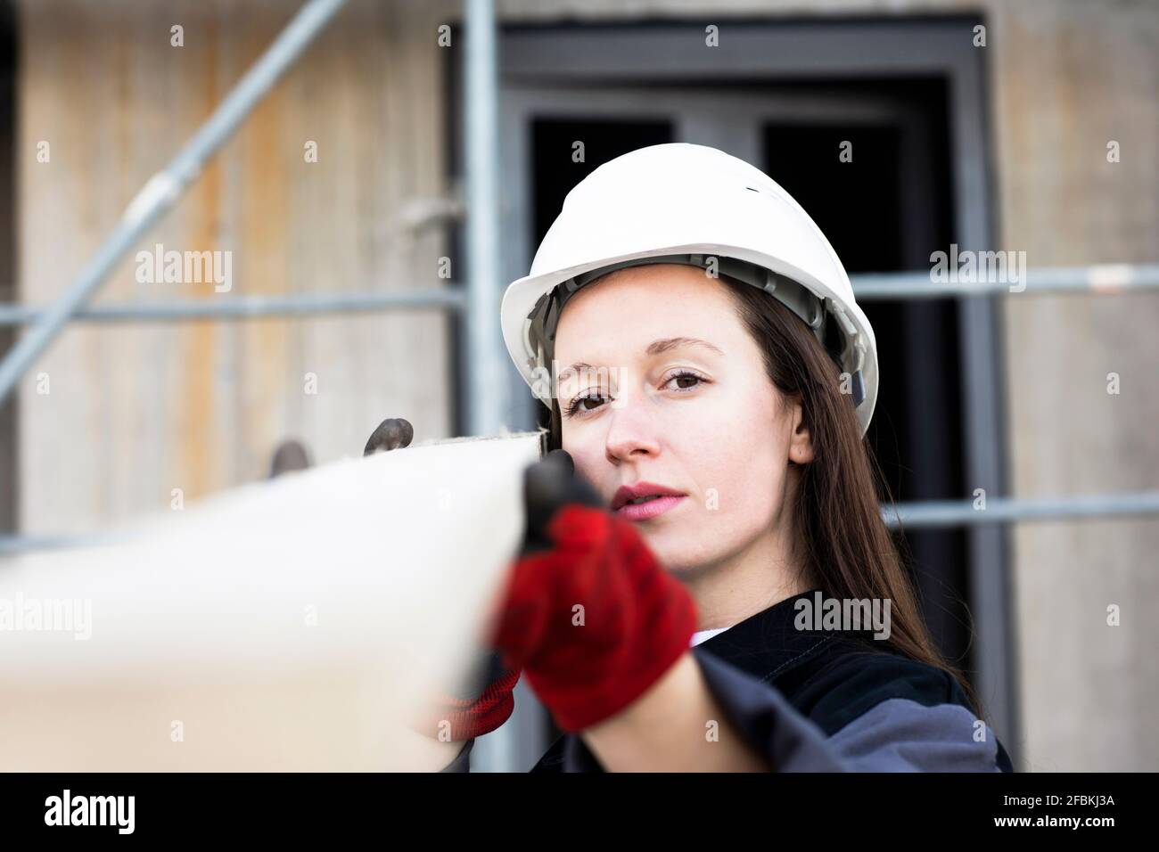 Female engineer examining at site Stock Photo