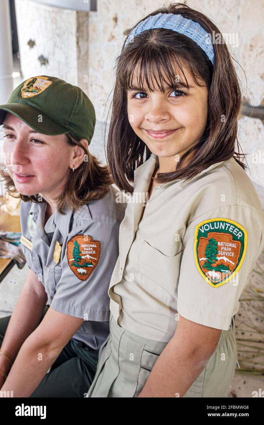Miami Florida,Homestead Biscayne National Park,Hispanic woman female park ranger student girl volunteer,wearing uniform patch, Stock Photo