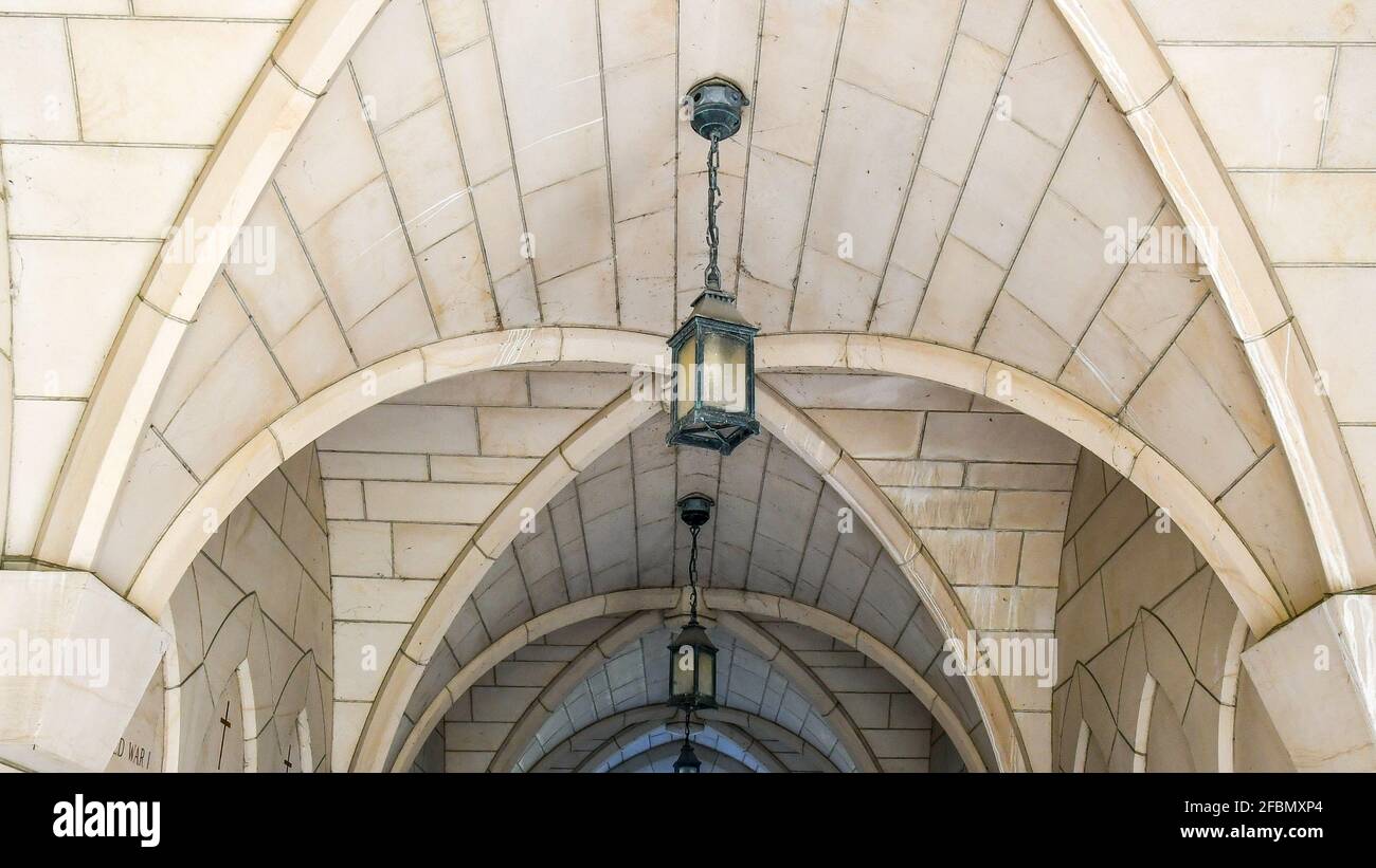 Saint Michael's College belonging to the University of Toronto (U of T). Architectural detail of an area honoring those fallen in war. Stock Photo