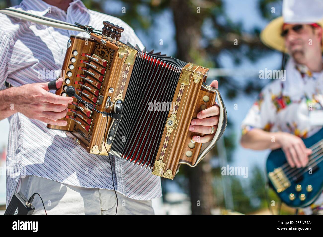 Deerfield Beach Florida Quiet Waters Park Zydeco Festival,Cajun music accordion bellows musician playing squeezebox, Stock Photo
