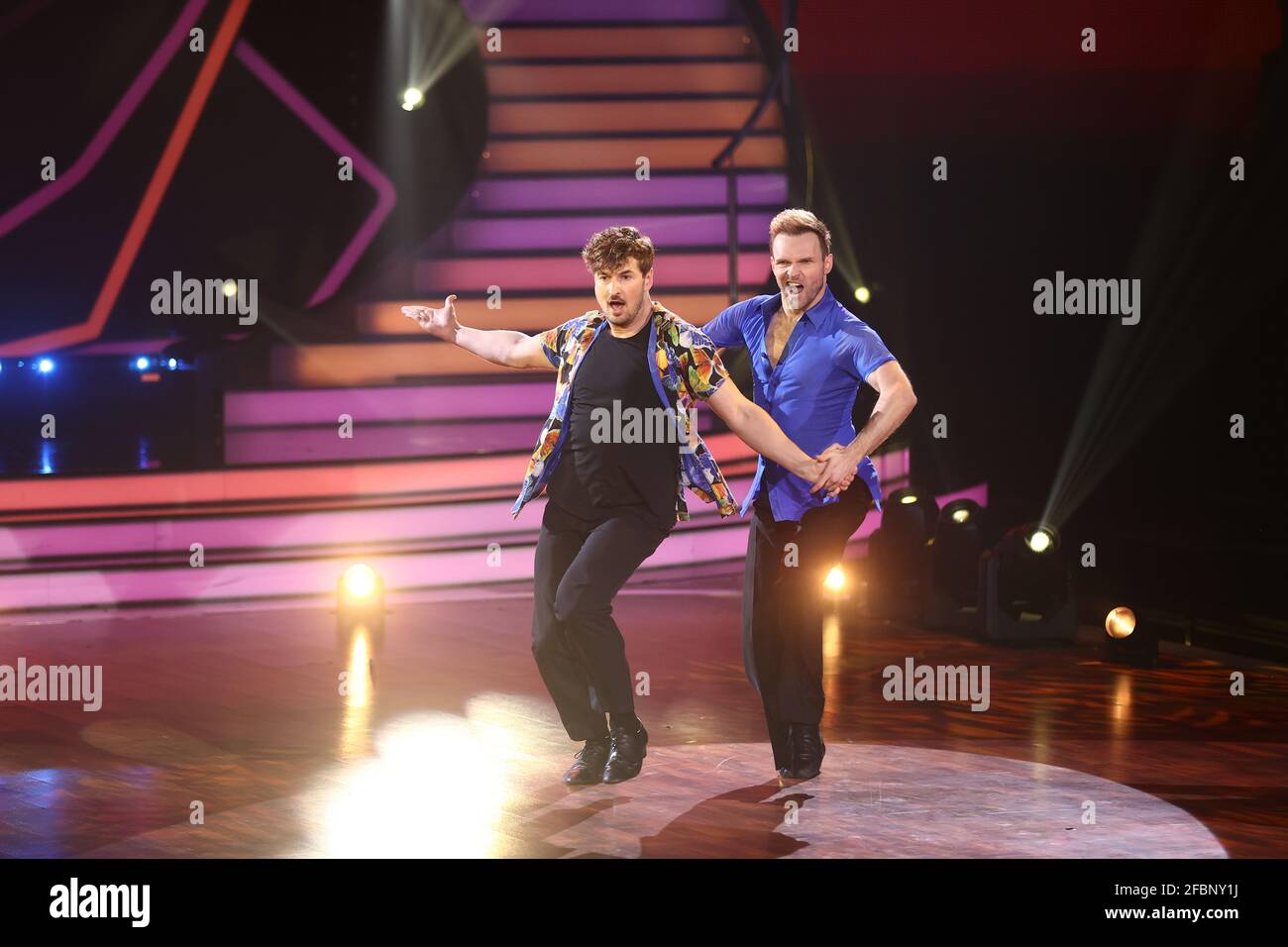Cologne, Germany. 23rd Apr, 2021. Nicolas Puschmann (l) and Vadim Garbuzov dance Samba to 'Te Quiero Baby' in the seventh RTL show of Lets Dance. Credit: Rolf Vennenbernd/dpa/Alamy Live News Stock Photo