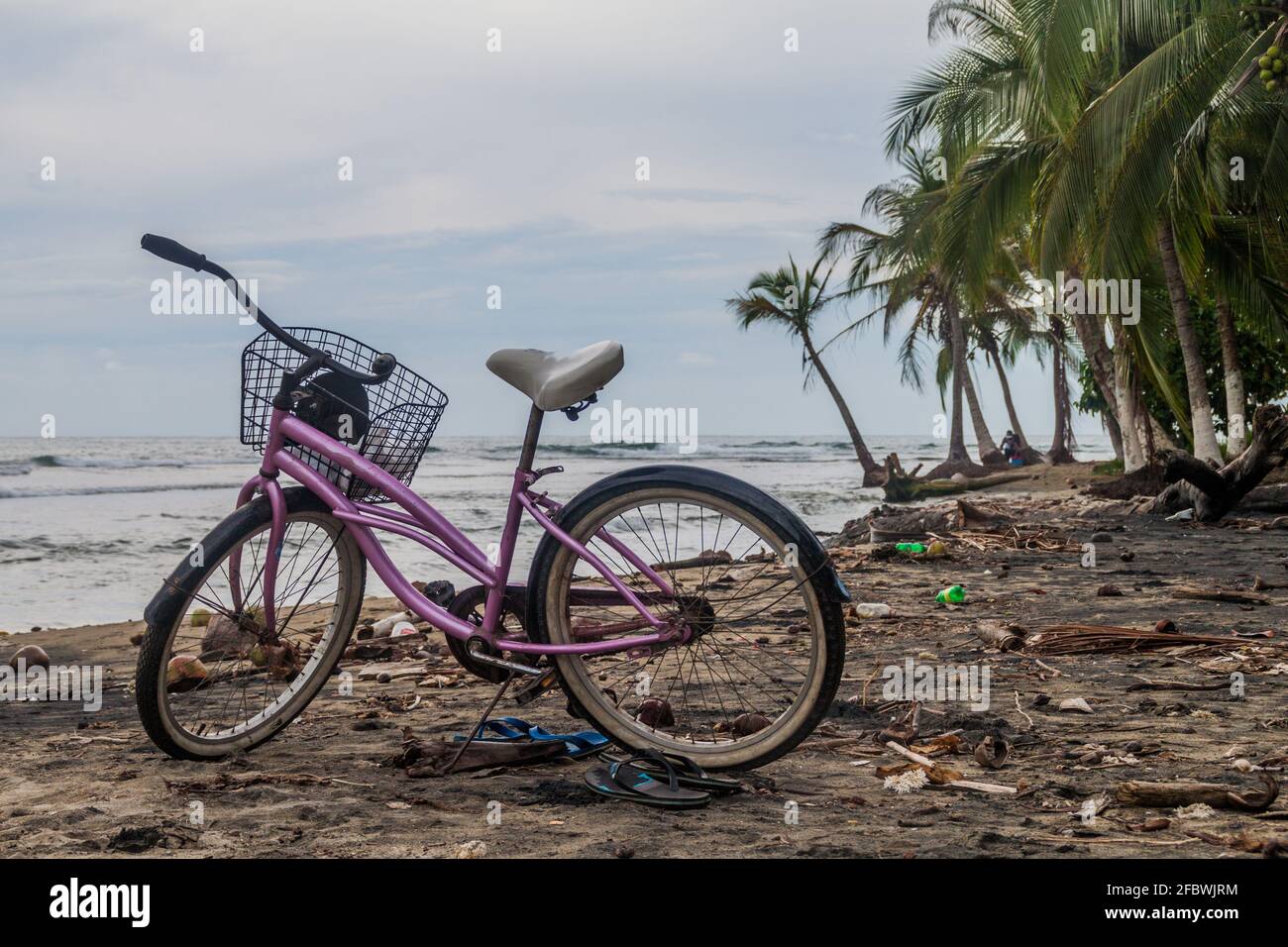Bicycle on a beach in Puerto Viejo de Talamanca village, Costa Rica Stock Photo
