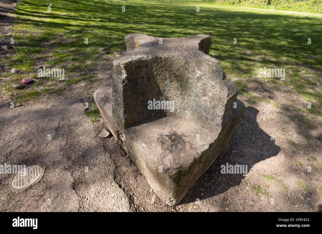 Four-sided stone seat half way up the Castle Dell was erected for Queen Victoria's Jubilee. Chepstow, Monmouthshire, Wales Stock Photo