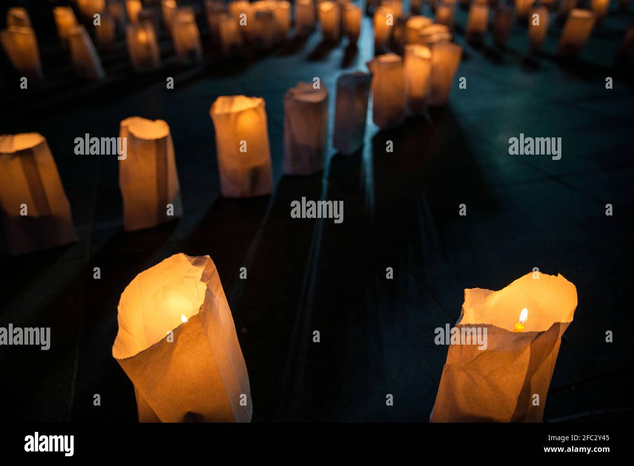 Bikfaya, Lebanon. 23rd Apr, 2021. Candles burn before an Armenian