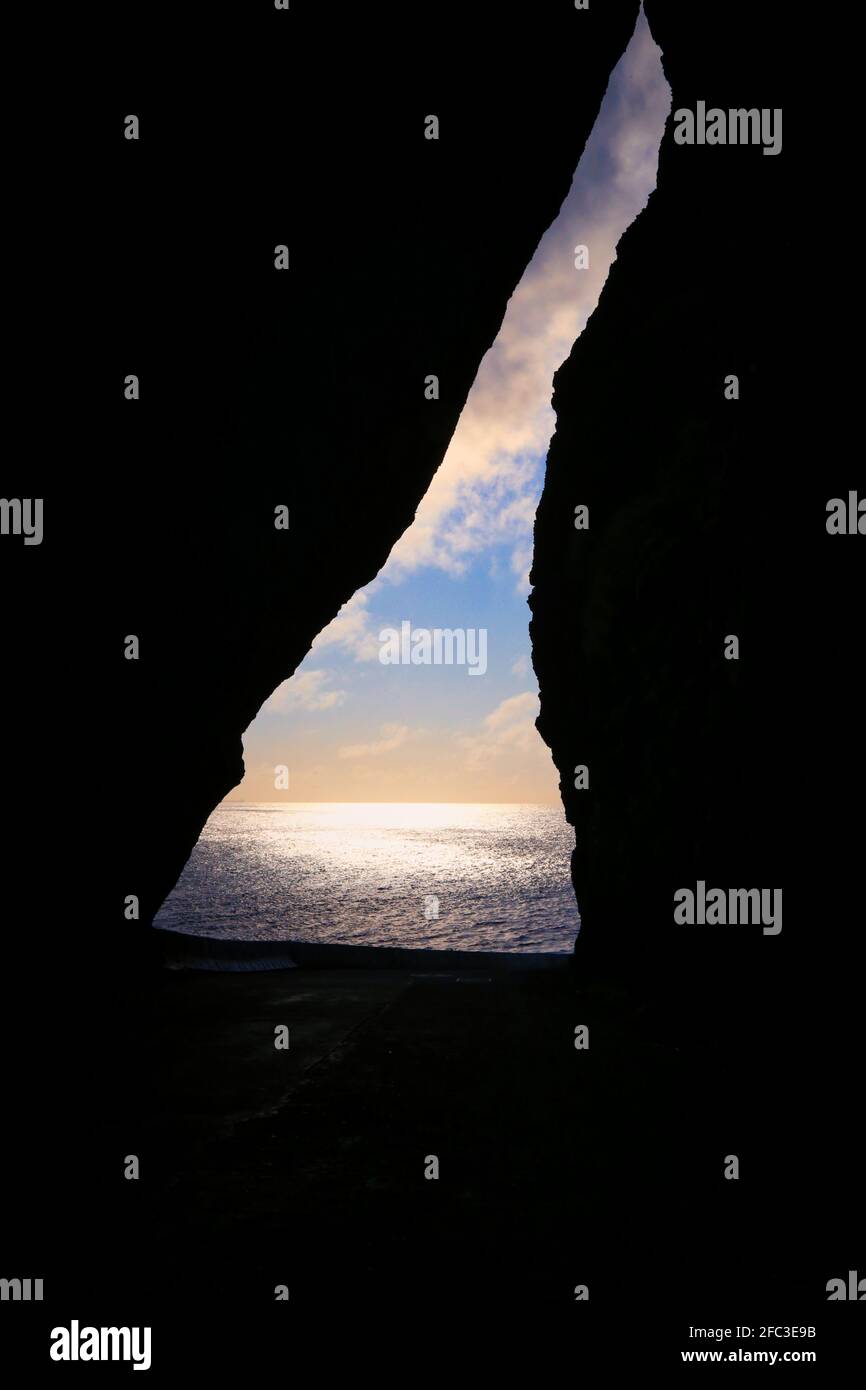 Sea view from Inside a rock arch on Lanyu Island ( Lan Yu ) Orchid Island near Taitung in Taiwan. Stock Photo