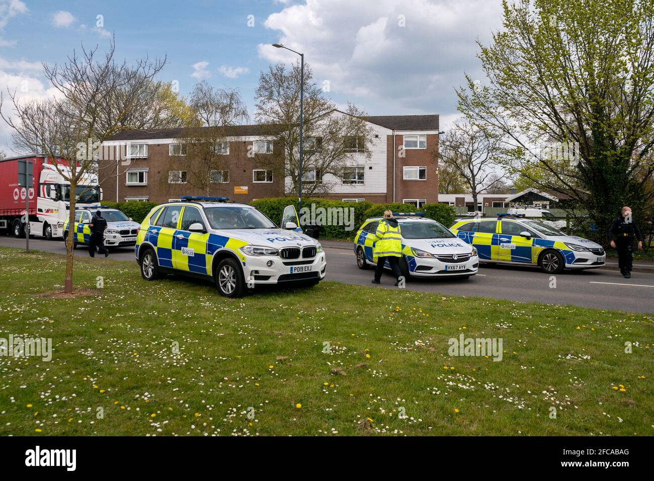 Four Warwickshire Police cars blocking a road during an incident in Leamington Stock Photo