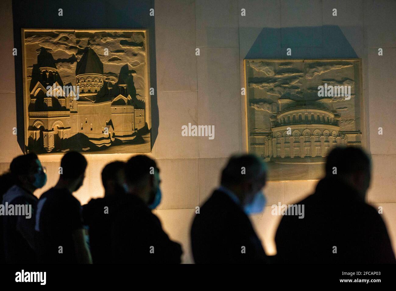 Bikfaya, Lebanon. 23rd Apr, 2021. People listen to a speech during a