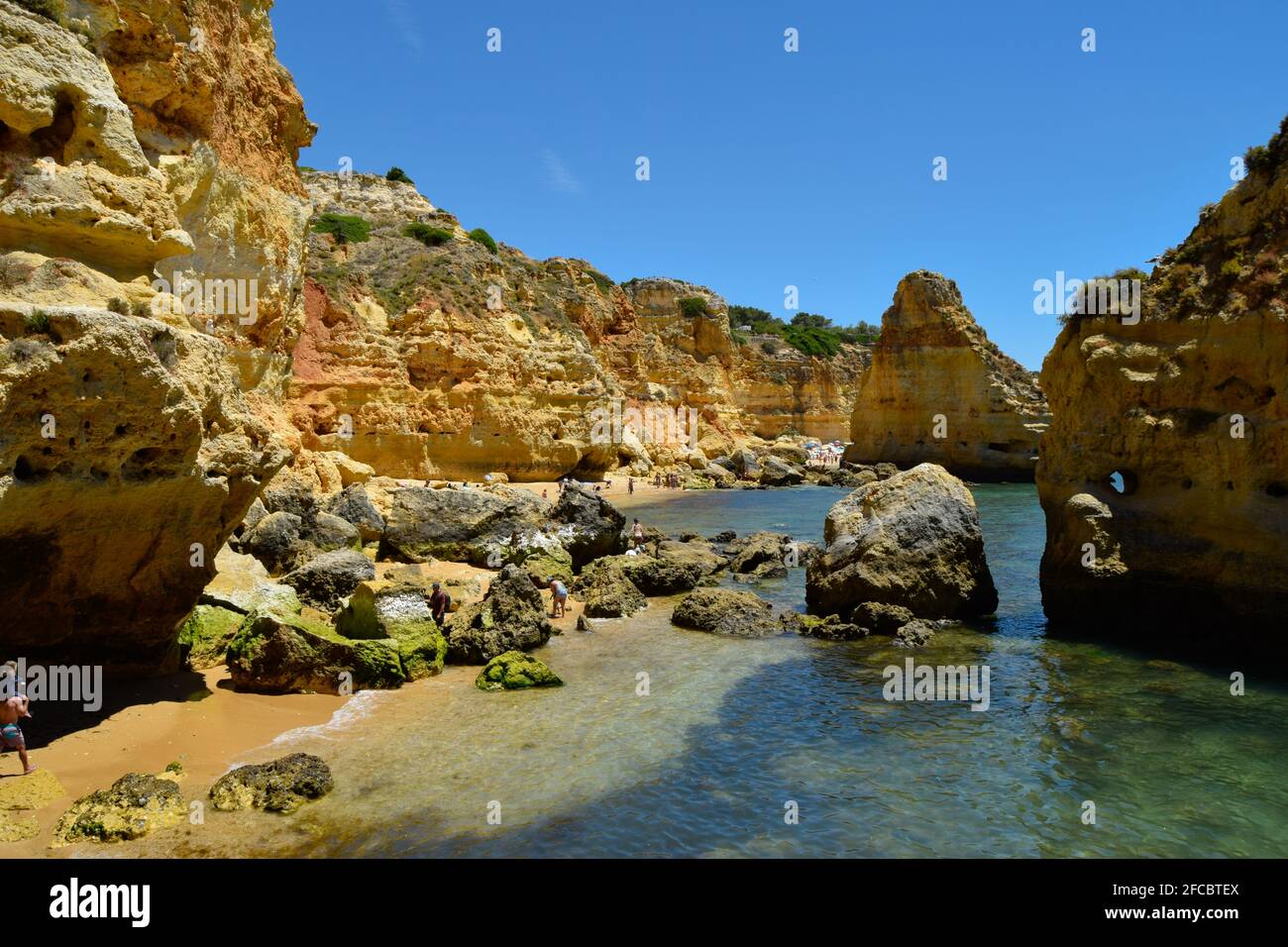 Praia da Marinha, Marinha beach in Algarve Portugal on summer time with beautiful sea and mountains views Stock Photo