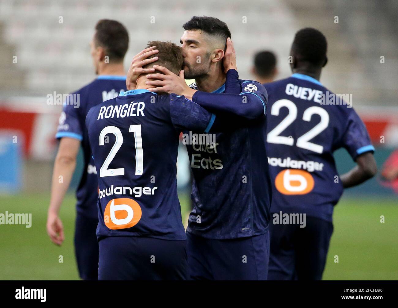 Alvaro Gonzalez of Marseille celebrates the third goal of his team with Valentin Rongier (left) during the French championship Ligue 1 football match between Stade de Reims and Olympique de Marseille (OM) on April 23, 2021 at Stade Auguste Delaune in Reims, France - Photo Jean Catuffe / DPPI Stock Photo