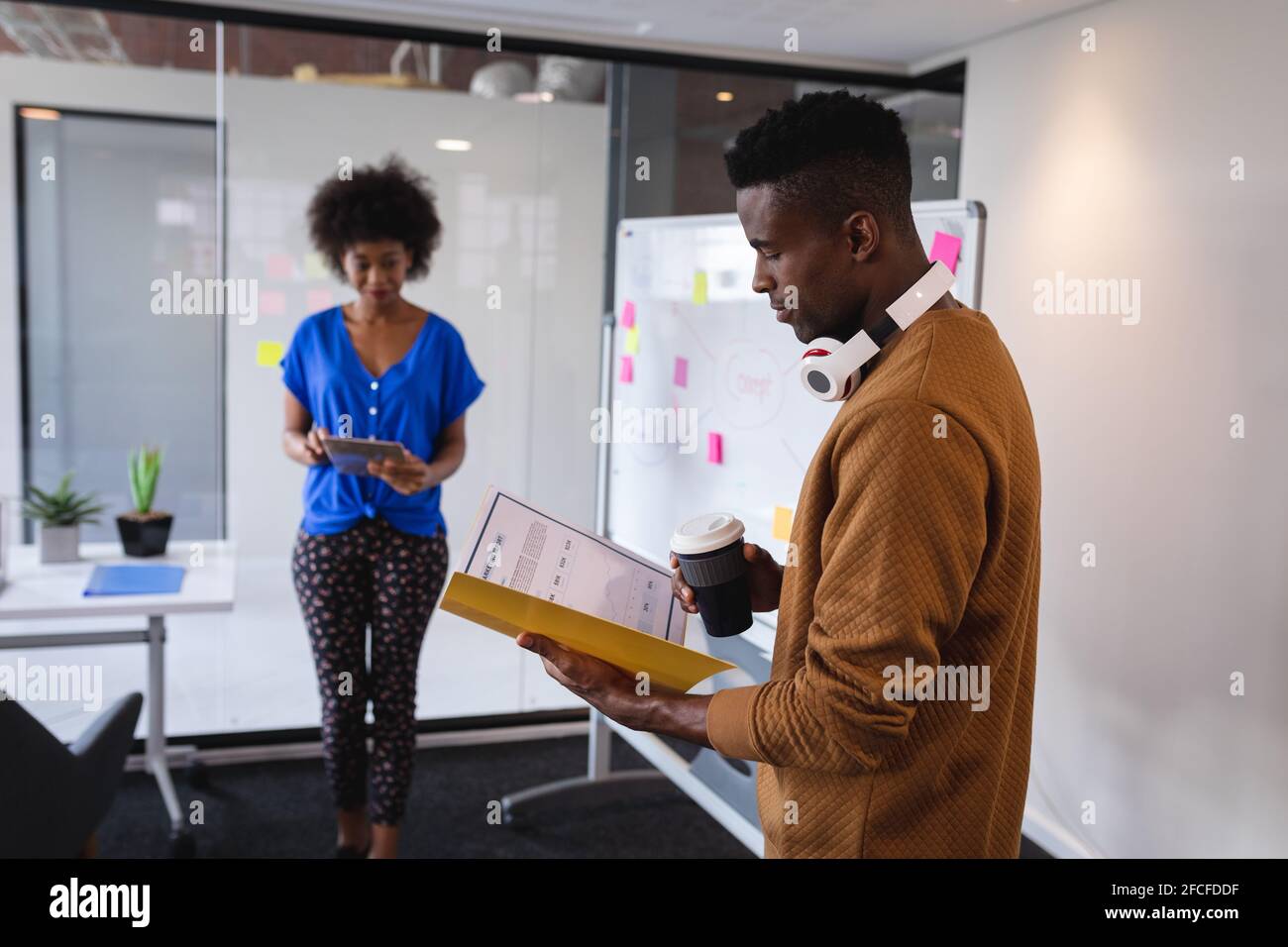 Female colleagues standing in hi-res stock photography and images - Alamy