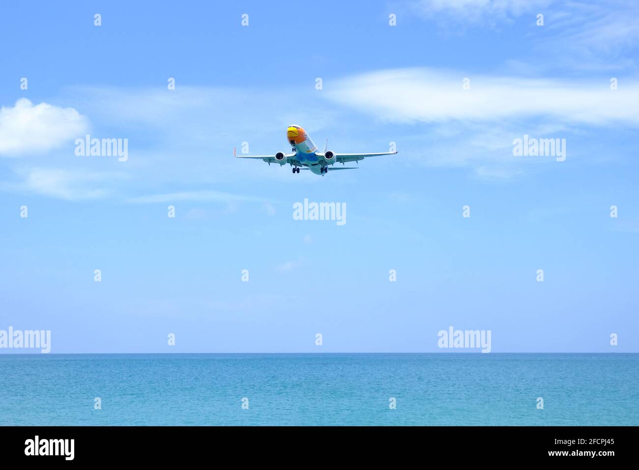 Puket THAILAND April 22, 2021: - NOK AIR FLIGHT is the budget airline of Thailand The plane is landing AT PHUKET AIRPORT THAILAND Stock Photo