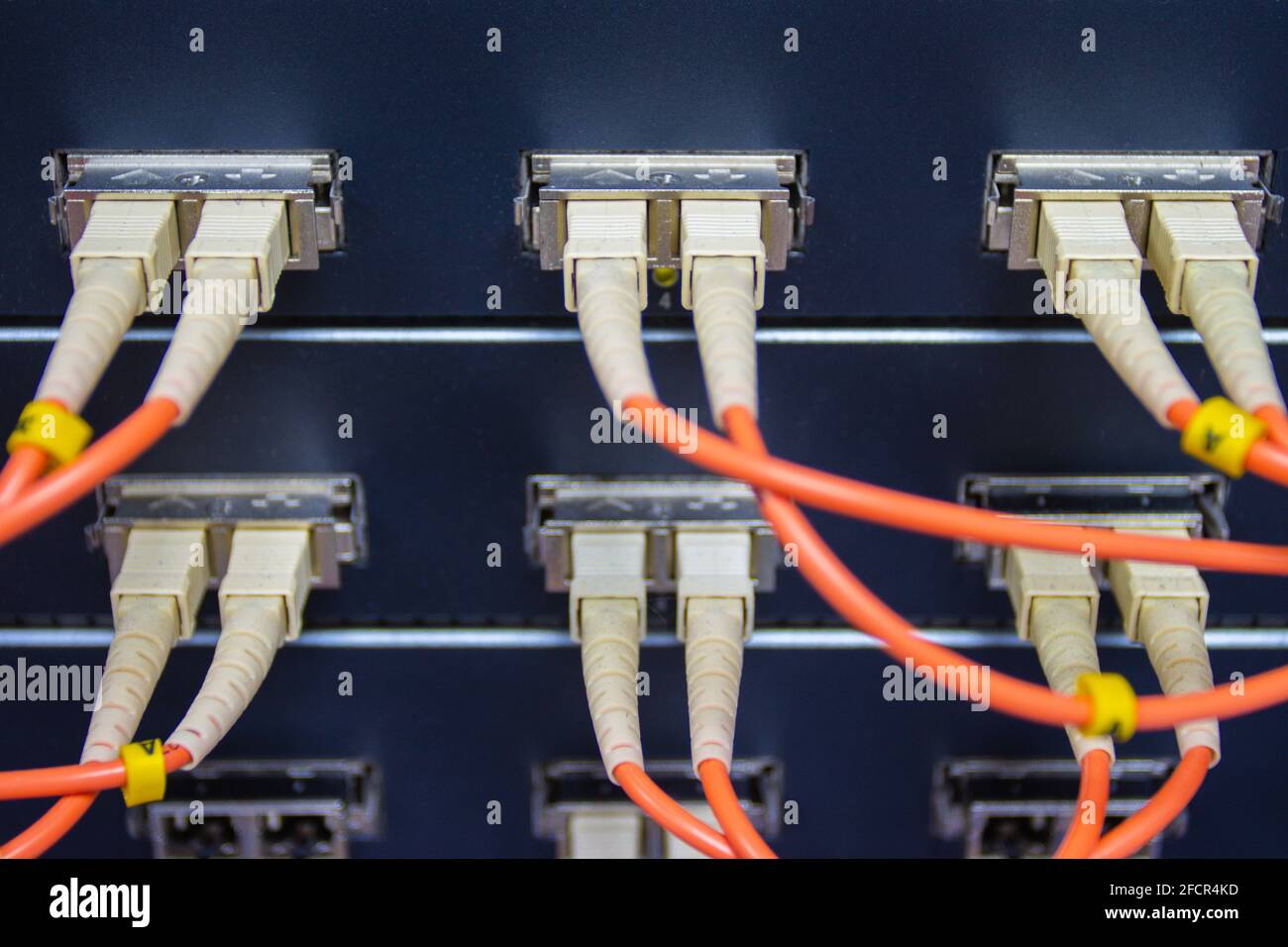 cable network, fiber optic cable connect to switch port in server room
