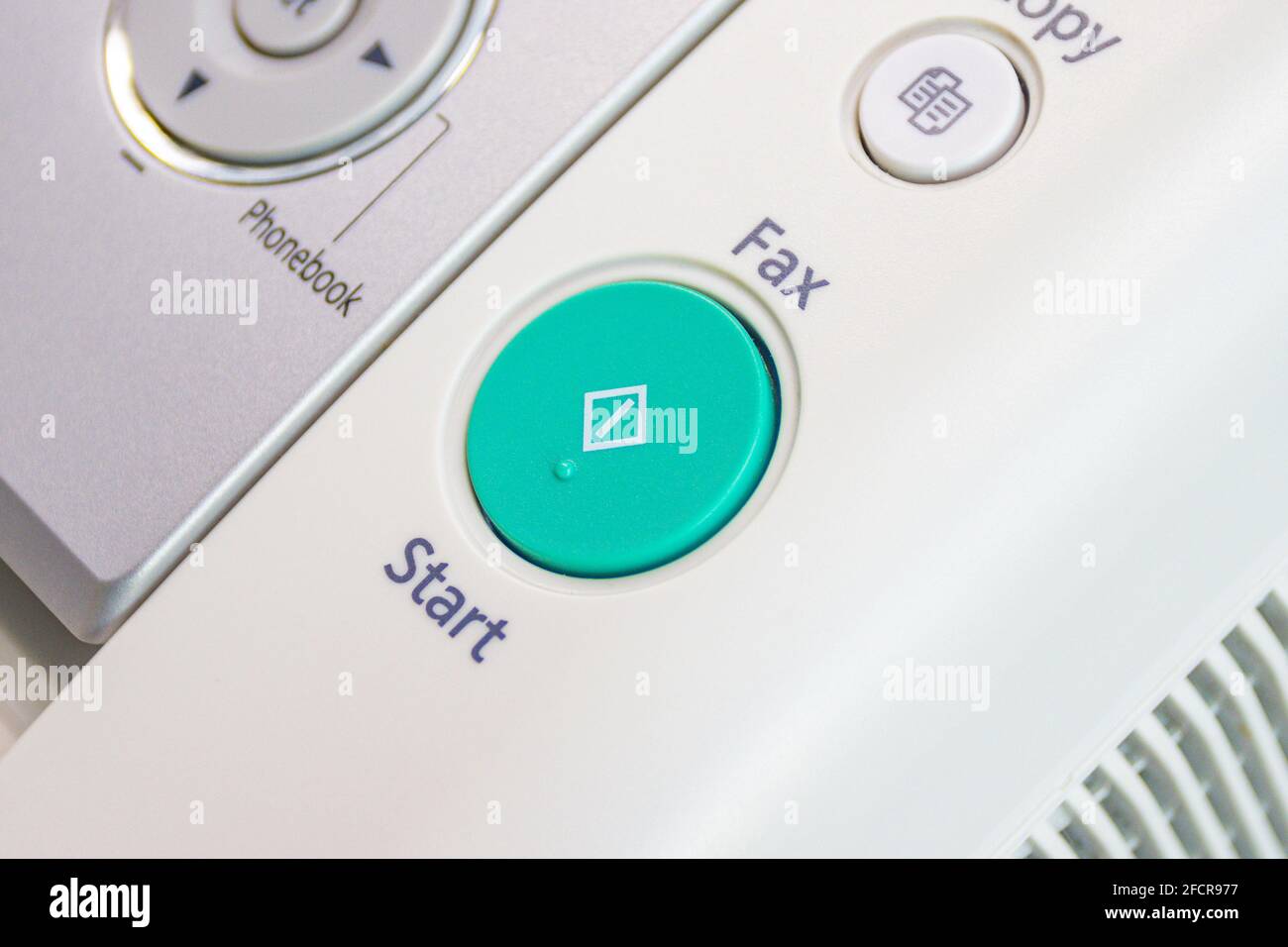 The fax machine use for Sending documents in the office, concept