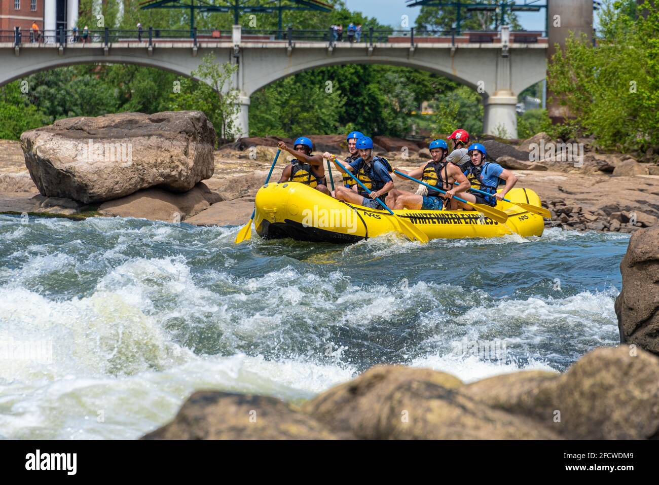 Whitewater rafting on the Chattahoochee River as it passes between downtown Columbus, Georgia, and Phenix City, Alabama. (USA) Stock Photo