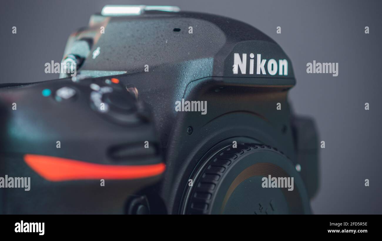 Galle, Sri Lanka - 02 17 2021: Nikon D850 DSLR body with camera body cap, Grip and front dials, and on-off switch close up. highest built quality Mode Stock Photo