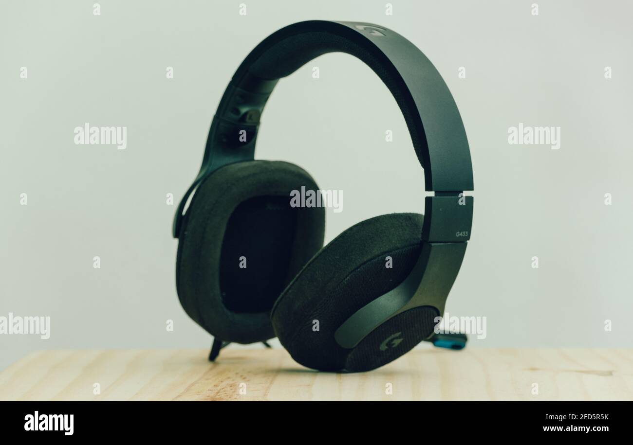 Galle, Sri Lanka - 02 18 2021: Logitech G433 gaming headset standing on-ear  cups on a computer table, the neutral color wall behind, modern and high-q  Stock Photo - Alamy
