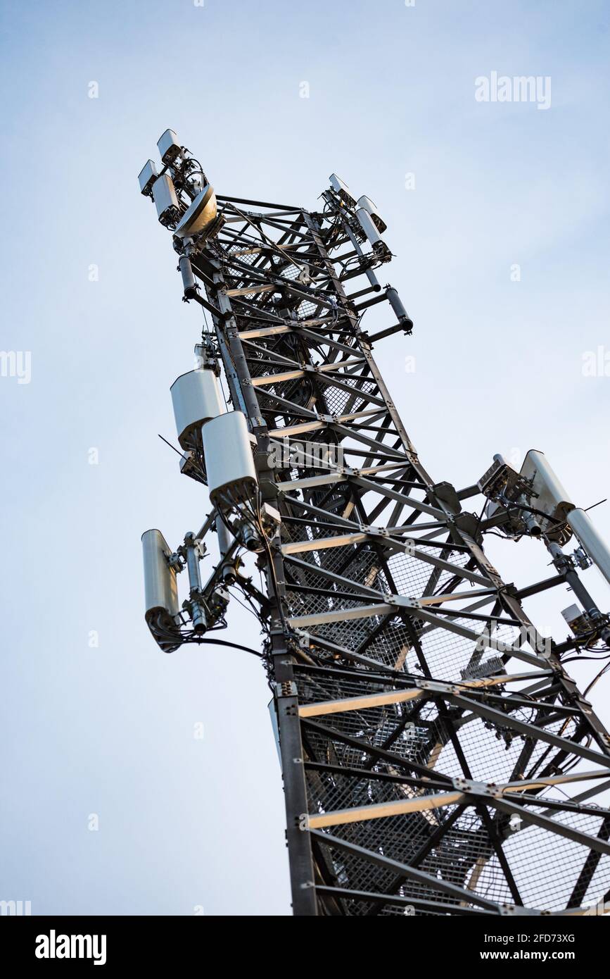 Mobile telephony base station. Metal mast structure with devices ...